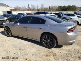 2016 Dodge Charger Road/Track with VIN 2C3CDXCT4GH310534, listed as a Copart auction lot 80055964 with 126,467 mi miles and Salvage Title. Bid and sale history available at carsss.com. Image 2.