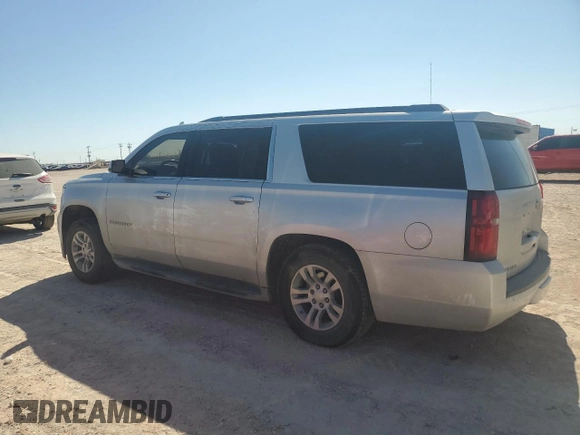 2017 Chevrolet Suburban LS with VIN 1GNSCGEC1HR139533, listed as a Copart auction lot 74292594 with 150,442 mi miles and Salvage title. Bid and sale history available at DreamBid. Image 2.