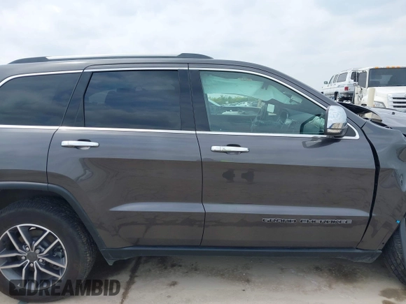 2021 Jeep Grand Cherokee 80th Anniversary with VIN 1C4RJFBG0MC504148, listed as a IAAI auction lot 42063979 with 77,941 mi miles and . Bid and sale history available at DreamBid. Image 14.
