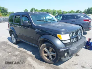 2010 Dodge Nitro SXT z VIN 1D4PT5GK9AW105356, wystawiony jako IAAI lot #42470210 z przebiegiem 161 734 mil mil oraz . Historia ofert i sprzedaży dostępna na DreamBid. Obrazek 1.
