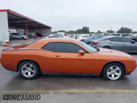 2011 Dodge Challenger z VIN 2B3CJ4DG9BH602419, wystawiony jako IAAI lot #40753257 z przebiegiem 124 282 mil mil oraz . Historia ofert i sprzedaży dostępna na DreamBid. Obrazek 13.