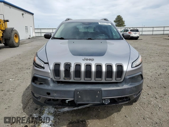 2014 Jeep Cherokee Trailhawk with VIN 1C4PJMBS6EW159174, listed as a Copart auction lot 56097795 with 130,299 mi miles and Salvage title. Bid and sale history available at DreamBid. Image 5.