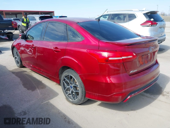 2015 Ford Focus SE with VIN 1FADP3F24FL362949, listed as a IAAI auction lot 41621904 with 104,447 mi miles. Bid and sale history available at carsss.com. Image 3.