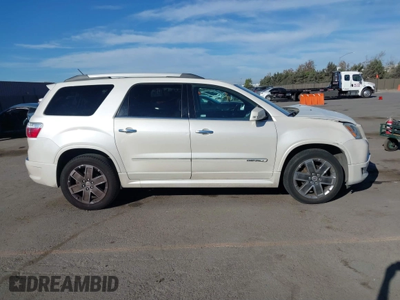 2011 GMC Acadia Denali z VIN 1GKKRTED0BJ334817, wystawiony jako IAAI lot #40957886 z przebiegiem 186 093 mil mil oraz . Historia ofert i sprzedaży dostępna na DreamBid. Obrazek 13.