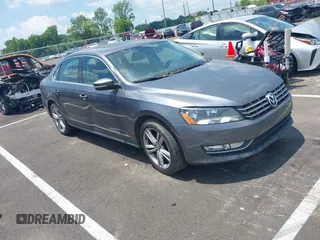 2014 Volkswagen Passat SEL Premium with VIN 1VWCN7A34EC067929, listed as a IAAI auction lot 42671472 with 119,469 mi miles and . Bid and sale history available at DreamBid. Image 1.