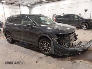 2019 Volkswagen Tiguan SE with VIN 3VV2B7AX3KM017948, listed as a IAAI auction lot 41564360 with 129,302 mi miles and . Bid and sale history available at DreamBid. Image 1.
