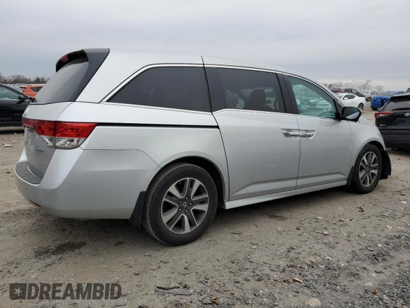 2015 Honda Odyssey Touring Elite with VIN 5FNRL5H92FB114509, listed as a Copart auction lot 43801615 with 106,054 mi miles and Salvage title. Bid and sale history available at DreamBid. Image 3.