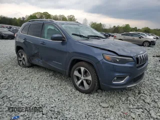2020 Jeep Cherokee Limited with VIN 1C4PJLDB0LD653580, listed as a Copart auction lot 52700875 with 114,517 mi miles and Salvage title. Bid and sale history available at DreamBid. Image 4.
