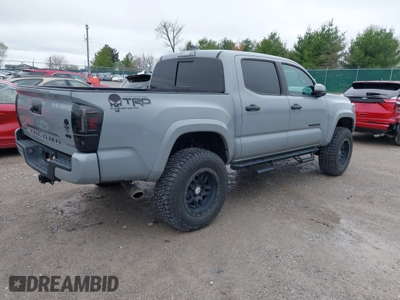 2021 Toyota Tacoma SR z VIN 3TMCZ5AN5MM372821, wystawiony jako IAAI lot #41886586 z przebiegiem 68 878 mil mil oraz . Historia ofert i sprzedaży dostępna na DreamBid. Obrazek 4.