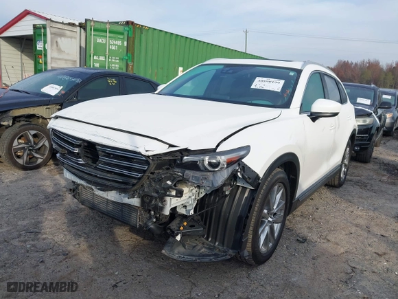 2016 Mazda CX-9 Grand Touring with VIN JM3TCBDY3G0116309, listed as a IAAI auction lot 40890199 with 64,948 mi miles. Bid and sale history available at carsss.com. Image 18.
