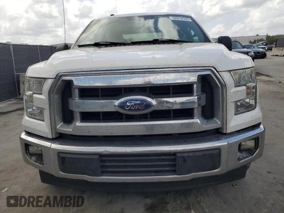2017 Ford F-150 XL with VIN 1FTEW1CFXHFC04386, listed as a Copart auction lot 52819555 with 167,813 mi miles and Salvage title. Bid and sale history available at DreamBid. Image 5.