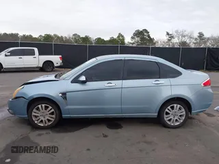 2008 Ford Focus SE with VIN 1FAHP35N78W270569, listed as a IAAI auction lot 38518647 with 173,674 mi miles. Bid and sale history available at carsss.com. Image 14.