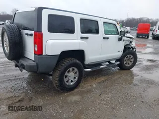 2007 Hummer H3 SUV with VIN 5GTDN13E978173651, listed as a IAAI auction lot 41865862 with 149,857 mi miles. Bid and sale history available at carsss.com. Image 4.