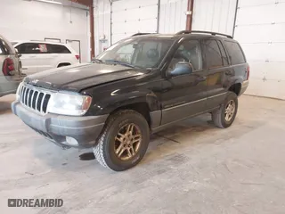 2002 Jeep Grand Cherokee Laredo with VIN 1J4GW48SX2C118434, listed as a IAAI auction lot 42036464 with 187,263 mi miles. Bid and sale history available at carsss.com. Image 2.
