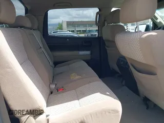 2008 Toyota Tundra z VIN 5TFEV54128X049128, wystawiony jako IAAI lot #42249292 z przebiegiem 313 233 mil mil oraz . Historia ofert i sprzedaży dostępna na DreamBid. Obrazek 8.