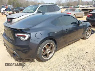 2016 Scion FR-S with VIN JF1ZNAA13G9702833, listed as a IAAI auction lot 41795687 with 71,161 mi miles and . Bid and sale history available at carsss.com. Image 4.