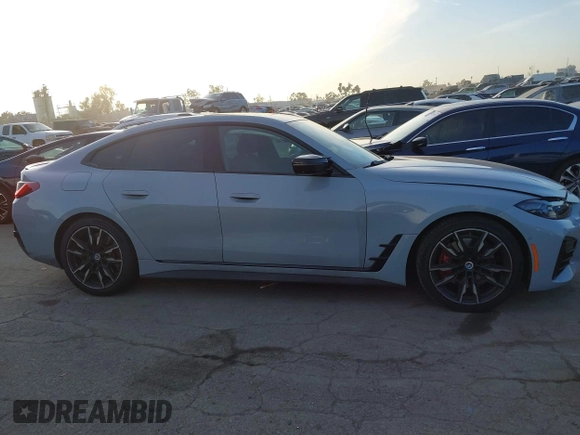 2023 BMW 4 Series M440i with VIN WBA63AW02PFN40551, listed as a IAAI auction lot 41230910 with 23,526 mi miles and . Bid and sale history available at DreamBid. Image 13.