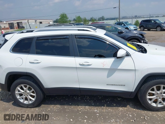 2016 Jeep Cherokee Latitude with VIN 1C4PJMCB8GW148470, listed as a IAAI auction lot 42415483 with 146,427 mi miles and . Bid and sale history available at DreamBid. Image 14.