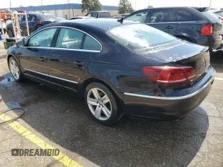 2015 Volkswagen CC Sport z VIN WVWBP7AN8FE804114, wystawiony jako Copart lot #54880245 z przebiegiem 124 639 mil mil oraz Tytuł czysty. Historia ofert i sprzedaży dostępna na DreamBid. Obrazek 2.