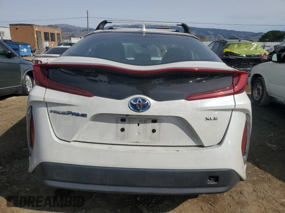 2020 Toyota Prius LE with VIN JTDKARFP3L3153702, listed as a Copart auction lot 44709075 with 124,125 mi miles and Salvage Title. Bid and sale history available at DreamBid. Image 6.
