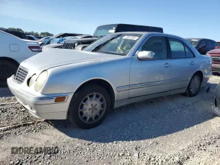 2001 Mercedes-Benz E-Class with VIN WDBJF65J11B294200, listed as a Copart auction lot 73831854 with 117,441 mi miles and Salvage Title. Bid and sale history available at carsss.com. Image 1.