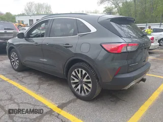 2020 Ford Escape Titanium with VIN 1FMCU9J96LUA00564, listed as a IAAI auction lot 42261152 with 73,748 mi miles and . Bid and sale history available at DreamBid. Image 3.