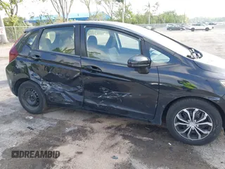 2016 Honda Fit LX with VIN JHMGK5H59GS002090, listed as a IAAI auction lot 41761887 with 97,577 mi miles. Bid and sale history available at carsss.com. Image 6.