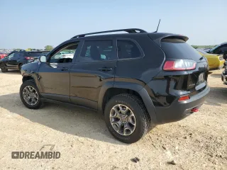 2022 Jeep Cherokee Trailhawk с VIN 1C4PJMBX8ND502686, выставлен на аукционе Copart как лот 51180645 с пробегом 62 865 миль миль и Списание • Salvage title. История ставок и продаж доступна на DreamBid. Изображение 2.