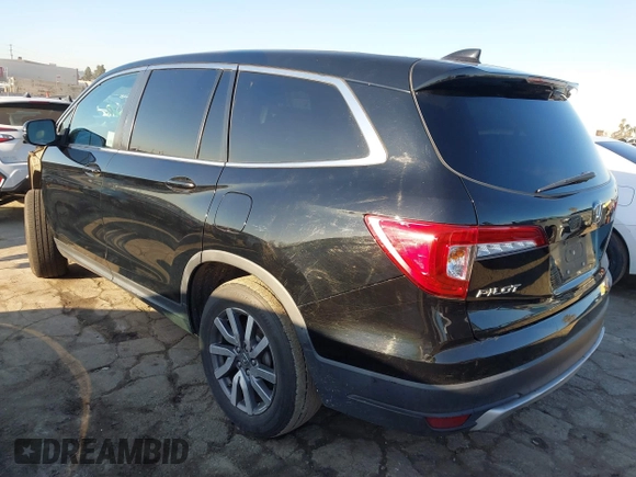 2021 Honda Pilot EX-L with VIN 5FNYF5H51MB004516, listed as a IAAI auction lot 41759992 with 75,476 mi miles. Bid and sale history available at carsss.com. Image 3.