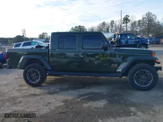 2023 Jeep Gladiator Overland with VIN 1C6HJTFG9PL507484, listed as a IAAI auction lot 41486457 with 54,871 mi miles. Bid and sale history available at carsss.com. Image 14.