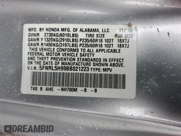 2011 Honda Odyssey Touring with VIN 5FNRL5H99BB021223, listed as a Copart auction lot 61171775 with 194,029 mi miles and Salvage title. Bid and sale history available at DreamBid. Image 14.
