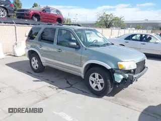 2007 Ford Escape Hybrid with VIN 1FMCU59H37KA92464, listed as a IAAI auction lot 42001479 with 159,147 mi miles. Bid and sale history available at carsss.com. Image 1.