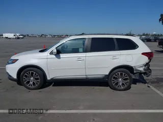 2016 Mitsubishi Outlander SE with VIN JA4AD3A33GZ013375, listed as a IAAI auction lot 42515722 with 106,804 mi miles and . Bid and sale history available at DreamBid. Image 14.