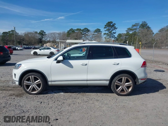 2016 Volkswagen Touareg Sport with VIN WVGEF9BP5GD012680, listed as a IAAI auction lot 41610943 with 153,952 mi miles and . Bid and sale history available at DreamBid. Image 14.