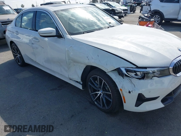 2019 BMW 3 Series 330i with VIN WBA5R1C55KAK12332, listed as a IAAI auction lot 41692035 with 13,657 mi miles and . Bid and sale history available at DreamBid. Image 6.