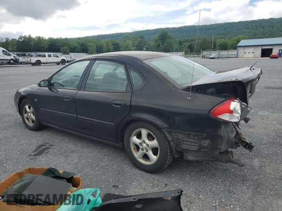 2001 Ford Taurus SEL with VIN 1FAFP56S01A258399, listed as a Copart auction lot 58963115 with 162,989 mi miles and Salvage title. Bid and sale history available at DreamBid. Image 2.