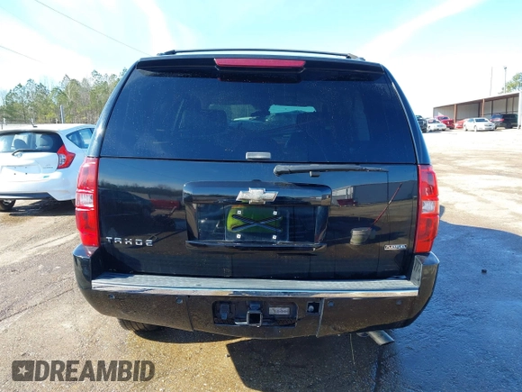 2009 Chevrolet Tahoe LTZ z VIN 1GNFK33049R297484, wystawiony jako IAAI lot #41305771 z przebiegiem 270 024 mil mil oraz . Historia ofert i sprzedaży dostępna na DreamBid. Obrazek 16.