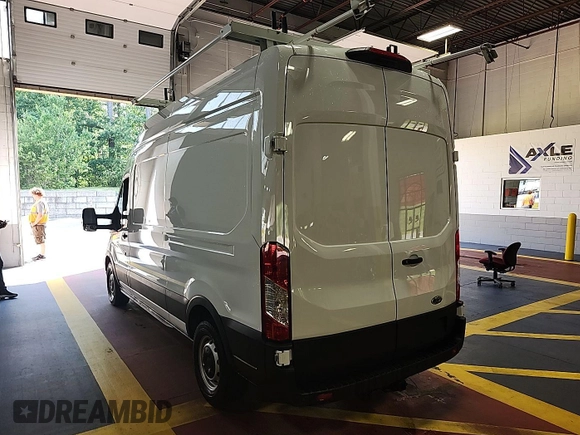 2023 Ford Transit Cargo z VIN 1FTBR1X83PKB55205, wystawiony jako IAAI lot #42569694 z przebiegiem 20 924 mil mil oraz . Historia ofert i sprzedaży dostępna na DreamBid. Obrazek 5.
