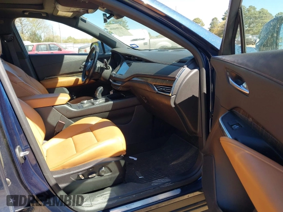 2019 Cadillac XT4 FWD Premium Luxury z VIN 1GYFZCR47KF109394, wystawiony jako IAAI lot #41864606 z przebiegiem 98 425 mil mil oraz . Historia ofert i sprzedaży dostępna na DreamBid. Obrazek 5.