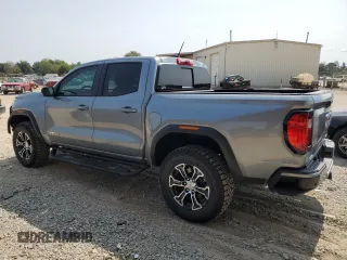 2024 GMC Canyon 4WD AT4 with VIN 1GTP6DEK9R1116173, listed as a Copart auction lot 71005134 with 5,298 mi miles and Salvage Title. Bid and sale history available at carsss.com. Image 2.