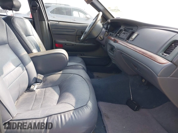 2000 Ford Crown Victoria LX z VIN 2FAFP74W4YX188831, wystawiony jako IAAI lot #41221337 z przebiegiem 169 380 mil mil oraz . Historia ofert i sprzedaży dostępna na DreamBid. Obrazek 5.