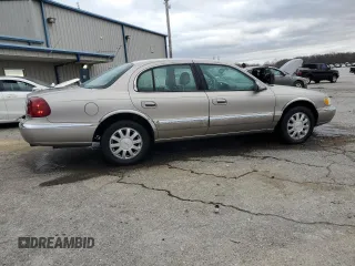 2001 Lincoln Continental with VIN 1LNHM97V41Y633841, listed as a Copart auction lot 86695664 with 166,931 mi miles and Salvage Title. Bid and sale history available at carsss.com. Image 3.