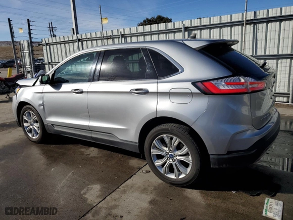 2022 Ford Edge Titanium with VIN 2FMPK4K97NBA54411, listed as a Copart auction lot 83673624 with 59,016 mi miles and Salvage Title. Bid and sale history available at carsss.com. Image 2.