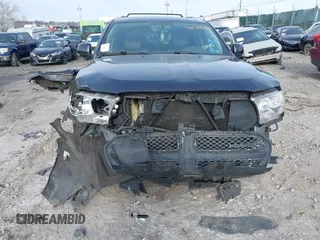 2012 Dodge Durango Crew with VIN 1C4RDJDG0CC337344, listed as a IAAI auction lot 41588370 with 162,339 mi miles. Bid and sale history available at carsss.com. Image 6.