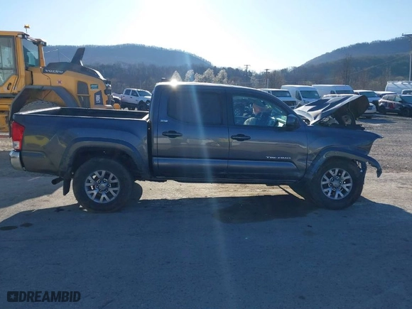 2017 Toyota Tacoma SR5 with VIN 5TFCZ5AN0HX063077, listed as a IAAI auction lot 41887043 with 142,015 mi miles. Bid and sale history available at carsss.com. Image 14.