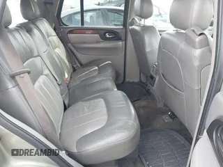 2003 GMC Envoy SLT with VIN 1GKDT13SX32161898, listed as a IAAI auction lot 41642072 with 230,154 mi miles. Bid and sale history available at carsss.com. Image 8.
