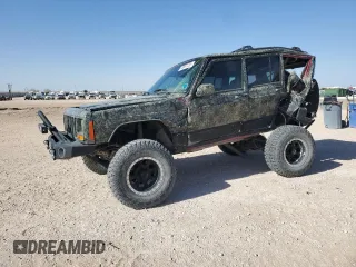 1999 Jeep Cherokee Sport with VIN 1J4FF68S6XL645028, listed as a Copart auction lot 48897255 with 218,552 mi miles and Salvage Title. Bid and sale history available at carsss.com. Image 1.