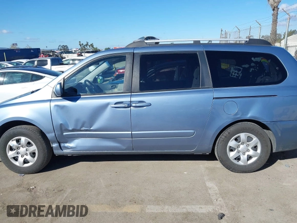 2008 Kia Sedona LX with VIN KNDMB233986218153, listed as a IAAI auction lot 41671096 with 144,933 mi miles. Bid and sale history available at carsss.com. Image 14.