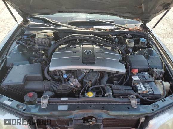 1996 Acura RL with VIN JH4KA965XTC009917, listed as a Copart auction lot 65083665 with 197,486 mi miles and Salvage title. Bid and sale history available at DreamBid. Image 11.