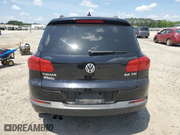 2012 Volkswagen Tiguan SEL with VIN WVGAV7AX2CW605399, listed as a Copart auction lot 55201935 with 128,527 mi miles and Clean Title. Bid and sale history available at DreamBid. Image 6.
